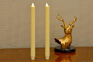 The flameless taper candles add a charming glow for your home